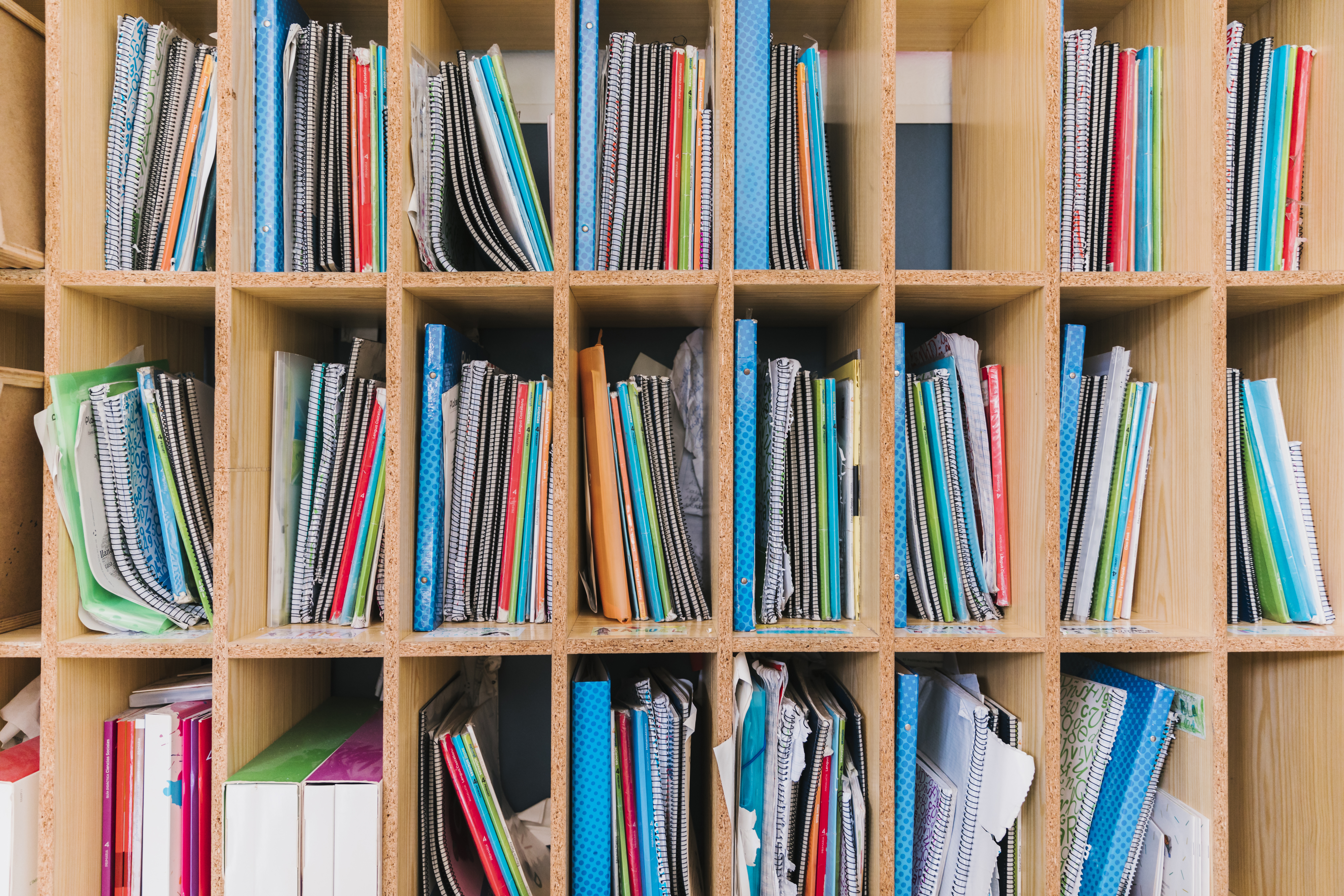 Shelf with Papers and Notebooks